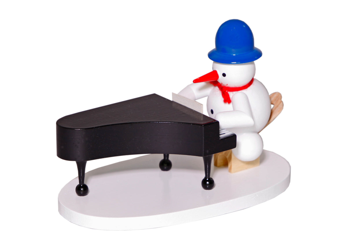 Schneemannmusikant am Flügel